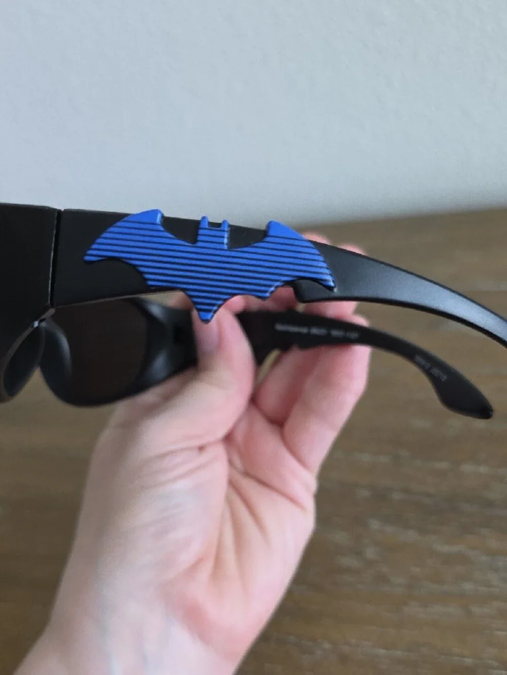 Black Sunglasses with Blue Bat Accent